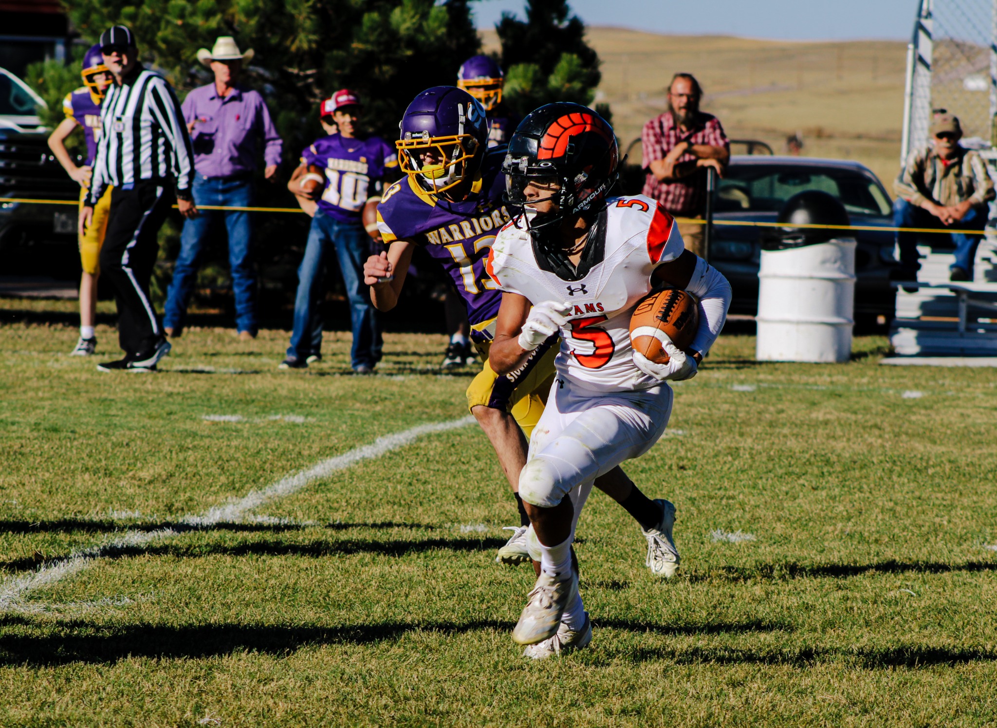 Football player running with the ball