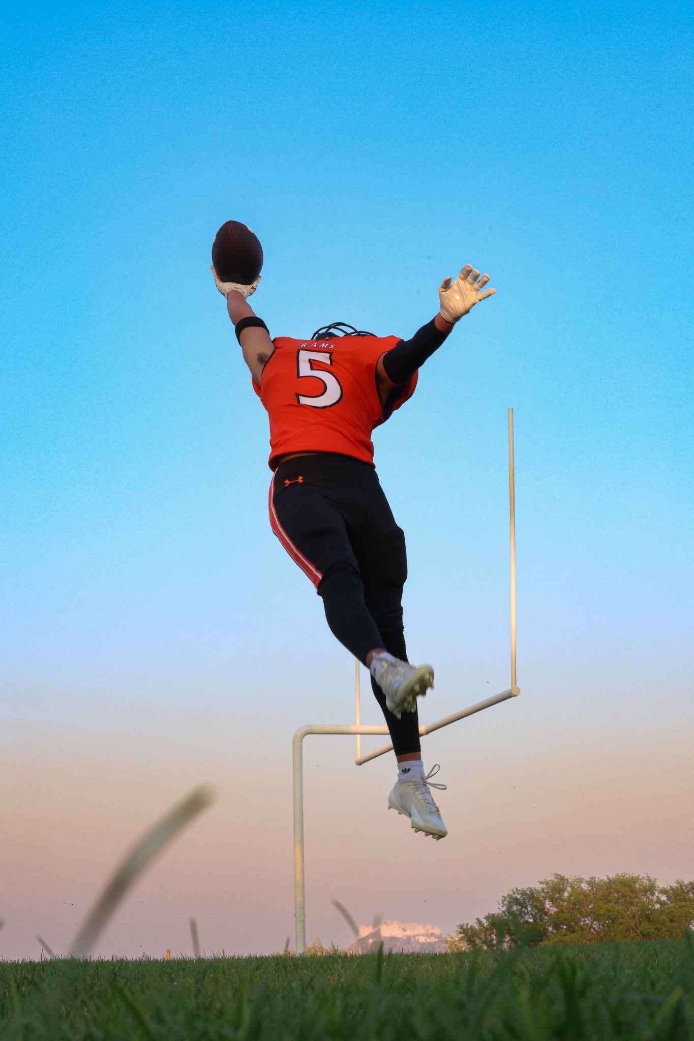 Creative football athlete portrait